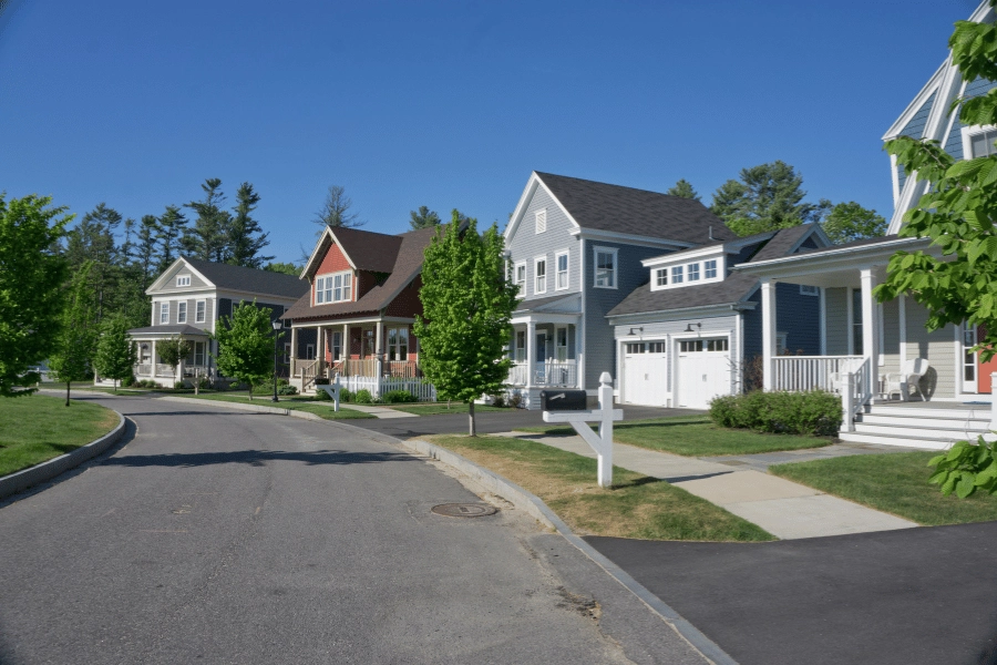 beautiful new housing on a curved street in a suburban neighborhood